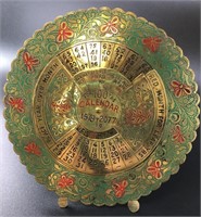 Beautiful brass 100 year calendar spanning the yea