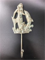Cast iron mermaid & dolphin wall hook with a lovel