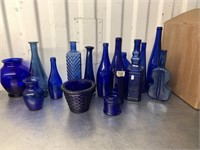 Lot with large set of blue glass including bottles
