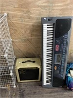Lot with Rogue Amplifier model CG 30 and Casio key