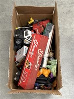 Box of misc toys/trucks