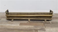 Antique ornate brass footed fireplace fender
