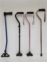 4 walking canes, bundled