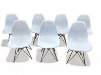 7 Mid century Eames-style molded plastic chairs