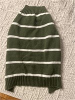 F7) Green and white medium dog sweater -like new