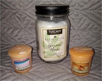 C11)New candles. One jar and two Yankee votives.