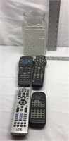 F13) FOUR REMOTES, IN GLASS JAR-NO LID