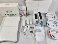 Pair of Nintendo Wii consoles, balance boards,