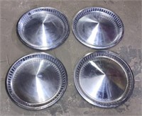 (ST) 1969 Cadillac Toronado hubcaps.