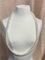 Synthetic pearl necklace with sterling clasp