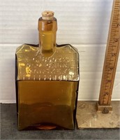 Old Cabin Whiskey amber glass bottle