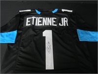 Travis Etienne signed football jersey COA
