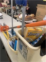Cleaning supplies and Bissell sweeper