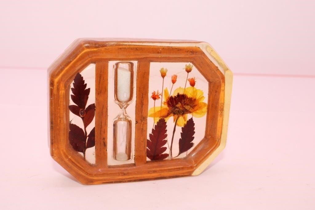 A Resin Coin Holder or Paperweight