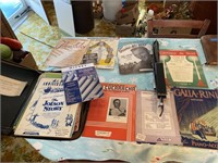 Accordion music and other sheet music and  stand
