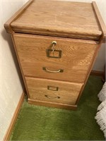 Oak colored two drawer filing cabinet