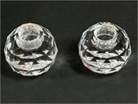Two cut crystal candle holders.