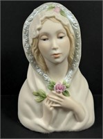 The cybis Madonna sculpture with rose.