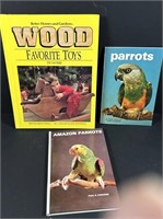 Books of parrots and wood toys.