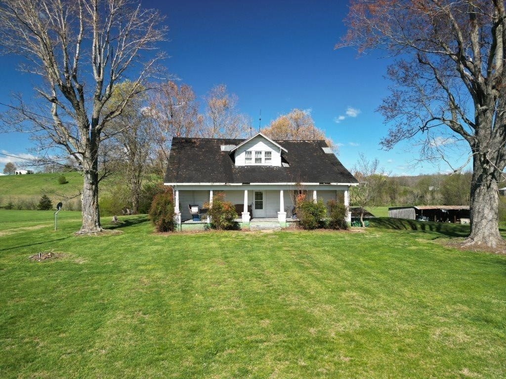 TRACT 1:  2.77 ACRES WITH LARGE OLDER FARMHOUSE,