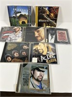 8 Toby Keith CDs.