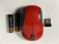 Red logitech wireless mouse.