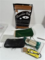 Humidor bag tobacco with pipe and cleaners.