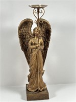 Angel candle holder.