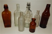 Lot of Old Clear & Amber Advertising Bottles