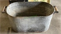Antique oval galvanized wash tub with wooden