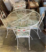 Oval outdoor rod iron patio table with four