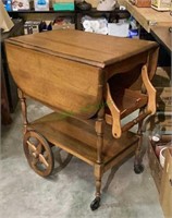 Antique styled wooden tea cart table with drop