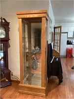 Lighted glass/mirrored curio cabinet