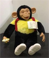 Adorable cheerful chimp plush toy with rubber