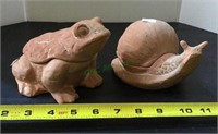 Two terra-cotta yard art pieces includes a snail