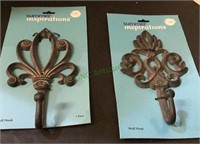 Set of two matching cast iron wall hooks each