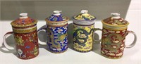 Set of four tall oriental themed ceramic mugs