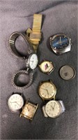 broken watch pieces