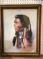 Print of a Native American brave. Framed and