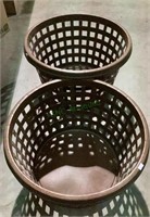 Two round brown laundry baskets.    636.