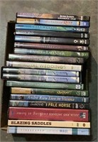 Box of DVDs includes titles such as the Grand