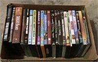 Box of DVDs includes titles such as Pirates of