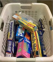 Large laundry basket with kitchen essentials.