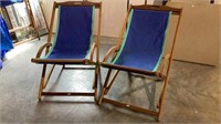 Matching pair of teak wood and canvas lounge