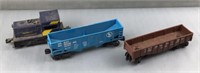 2 Lionel train cars and Lionel locomotive