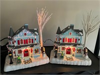 2 Christmas houses, one lights one lights out