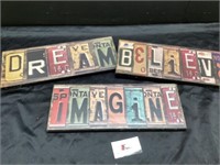 Wooden license plate looking signs