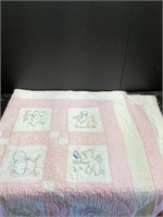 Antique embroidered baby quilt