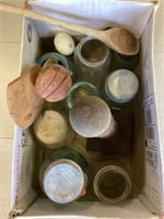 Box of glass jars and wooden spoons