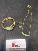 Green necklace, bracelet, and ring